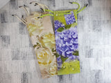 Geschenktüten Flasche; Blumen (25 Stück)